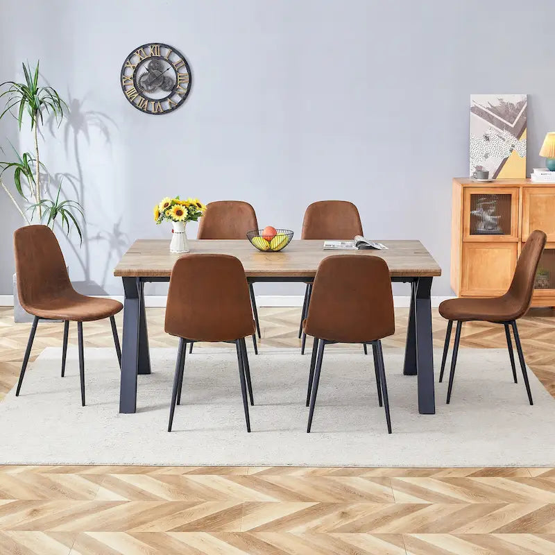 Ensemble de salle à manger moderne avec table rectangulaire noire à piètement en A et chaises à dossier rond