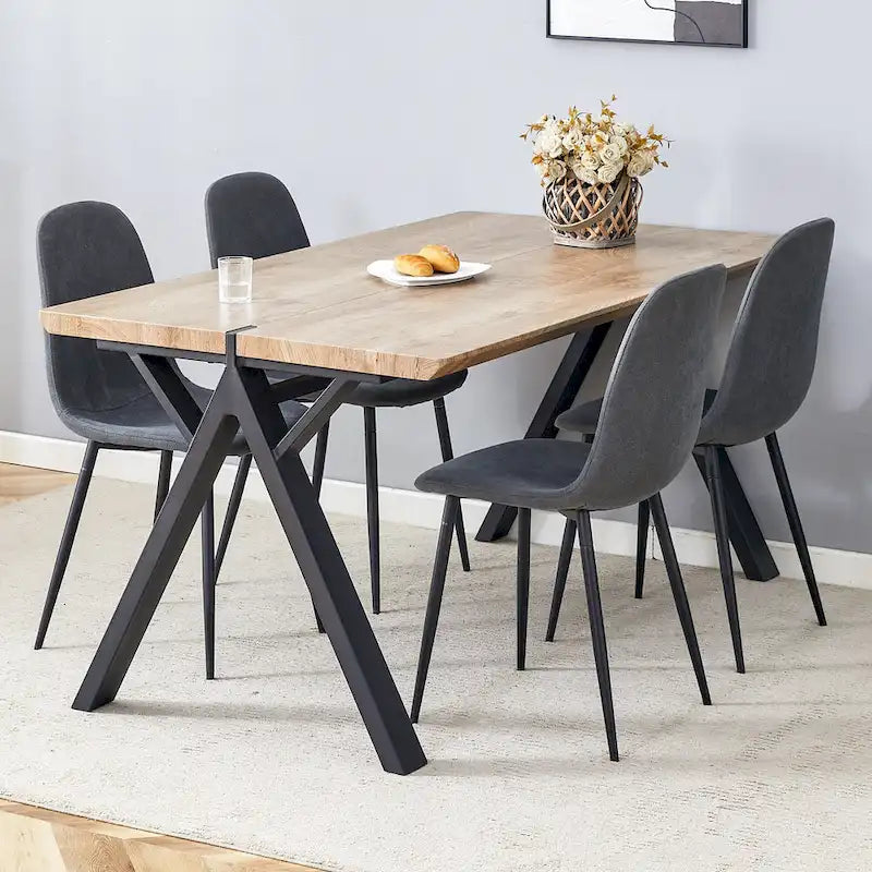 Ensemble de salle à manger moderne avec table rectangulaire noire à piètement en A et chaises à dossier rond