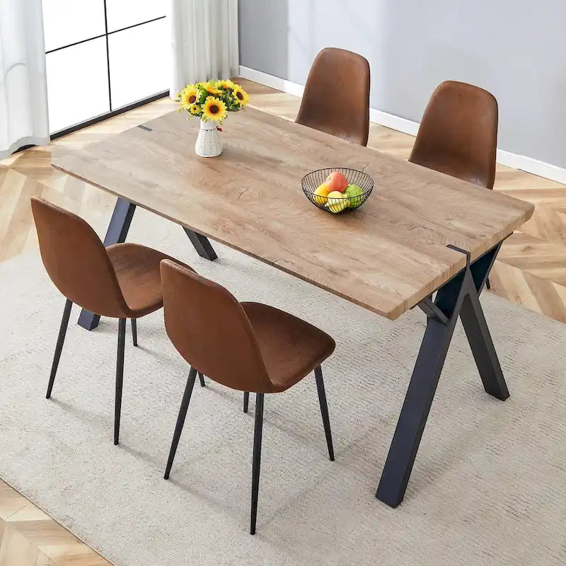 Ensemble de salle à manger moderne avec table rectangulaire noire à piètement en A et chaises à dossier rond
