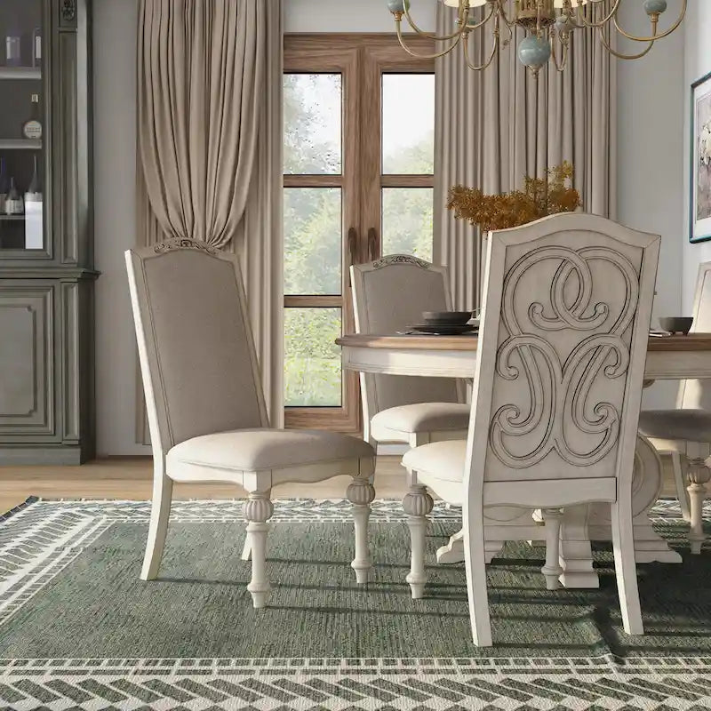 Ensemble de salle à manger rond 7 pièces rembourré en tissu blanc Caelum Farmhouse de The Gray Barn