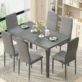 Ensemble de salle à manger 7 pièces Grondin Modern Style avec table en verre trempé et 6 chaises rembourrées en cuir PU